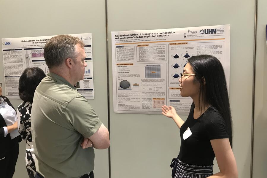 Summer Student showcasing research poster